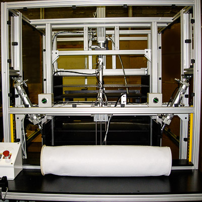 Packaging machinery for folding and packing filters into cardboard boxes